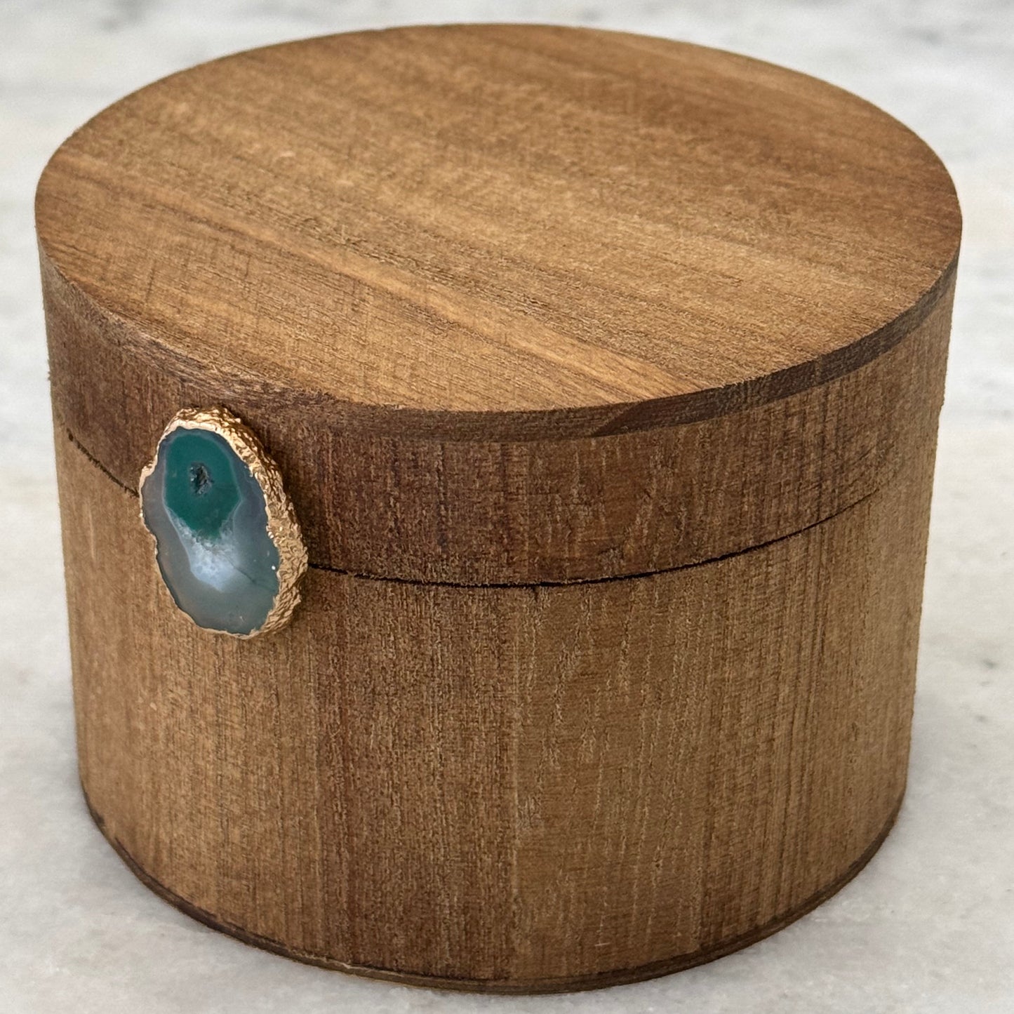 Wooden-style box with natural stone
